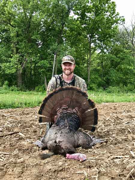 Turkey Hunter in a field at Winnebago Valley Hideaway
