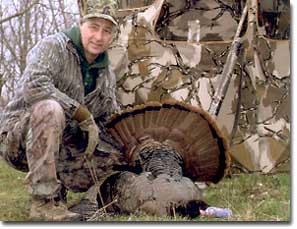 Turkey Hunter in front of Blind on Winnebago Valley Hideaway property